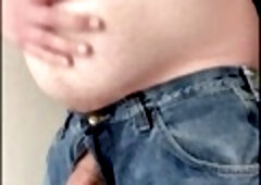 Jacking Off touching oil on belly and Cock