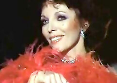 Joan Collins in naked scene from Poliziotto senza paura which was released in 1978, This Babe shows us her boobs