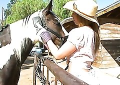 Ardent beauty in cowgirl hat goes interracial to be pounded doggy hard