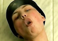 Gay twink relaxes while smoking and strokes his cock solo