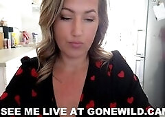 Sexy Blonde in Red Hearts Dress Teases in Kitchen