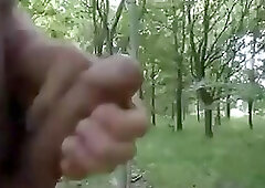 Naked cock play and cum in the sunny woods