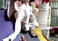 Young desi wife in a sundress explores naughty adventures with an Indian aunty