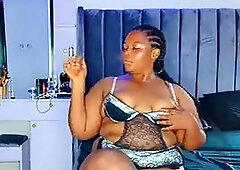 Ebony fat ass bounces and spreads shaved pussy