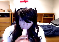 Cute Crossdresser Nurse Blows Dildo