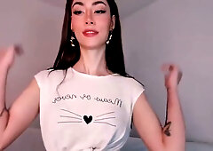 Brunette in lingerie and thigh-high socks teases solo on webcam at home