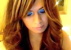 Busty TS in fishnet jerks by webcam