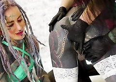 Femdom Anuskatzz dominates Trans Hotty with her Latex domme allies with Thong on and Sextoy