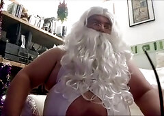 Erotic gay Santa squashing on a hairy man