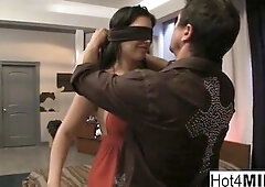Blindfolded brunette hair gets surprised with a three-some