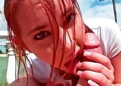 Redhead is playing tennis and getting naked to play with balls