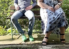 Charming mother in law pissing with legs widen outdoors