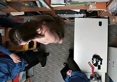 Teen thief tag teamed by security guards in the back office