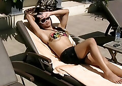 Busty ladyboy is sucking big cock after modeling at the pool