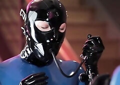 Sexy slim babe in latex bodysuit gets bound and gagged