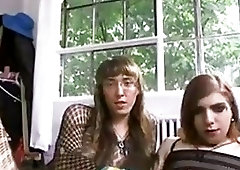 Two nerdy amateur crossdressers enjoy a wild anal on webcam