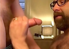 Bearded guy takes two loads to the face from his buddy