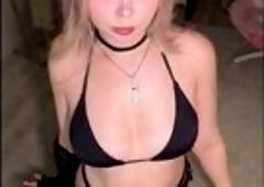Golden-haired hair frames her face as that babe kneels in lace and haunch highs ?