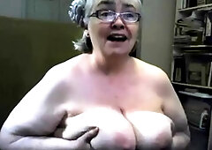 The fat and saggy gran is singing and showing tits