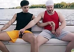 Best buds Marcus McNeil and Angel Elias decide to jerk off together on the boat