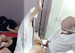 Husband, wife for exam and doctor is excited
