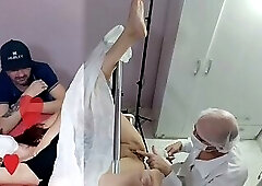 Husband, wife for exam and doctor is excited