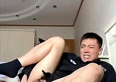 Chinese straight plays his asshole with toys