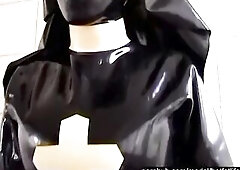 Ebony Latex Rubber Church Nun With High Heels Piddles Outdoor And Peeing In Pee Bag