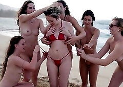 Cute Lesbo Honeys Get Stripped at The Beach