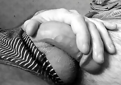 Hunk massages his cock. Large dick with saliva.