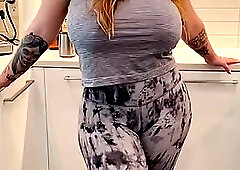 Plump woman with big, natural tits and tattoos is having sex in the middle of the day