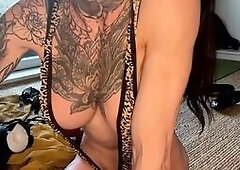 Inked Babe Teases in Leopard Lingerie