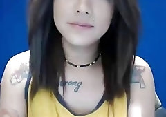 Beautiful brunette shemale shows off her dick before stroking it