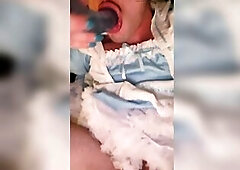 Sissy maid plays with sex toy and ears cum off it