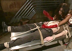 Busty ebony T-chick fucking bound man