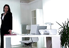 Kinky milf in high heels is sitting on the chair and fingering her wet pussy