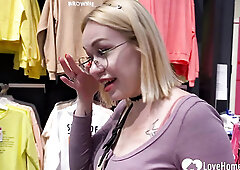 Girlfriend gives a blowjob in the changing booth