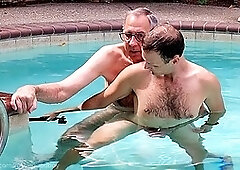 Daddy JT dives into a wild pool fuck with a hot young guy