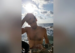 Klaus Joe Naked Next To A Restless Sea