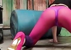 Playful shemale teen has some fun with a pink dildo