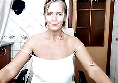 Gorgeous Lukerya this day 1st dresses in a jacket and a petticoat, then disrobes down to merely pants, sits on the washing machine, shakes her strippe