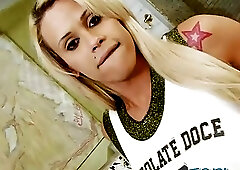 Busty blond tranny Rafaella Ferrari strokes her hard dick