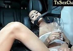 thin and bodyart with tits teases in a car