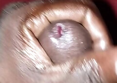 Afro male malik playing with his dong and cum