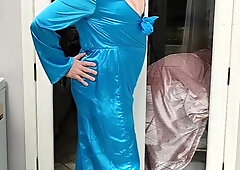Warm crossdresser in total satin jumpsuit