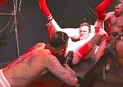 Tattooed stud Axel Abysse submits his hole during a wild fisting orgy