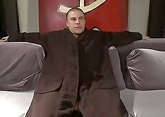 Horny crowd mercilessly gang fucks a bound hung stud