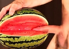 Muscular Stud Fucks and Cums on Watermelon