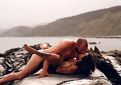 Busty tattooed brunette MILF gets fucked at the beach