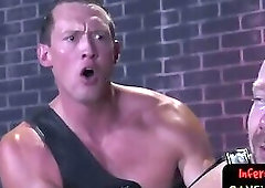 Muscular stud twists his fist up ass